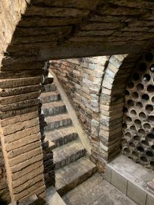 Here are ancient steps down into the wine cellar.