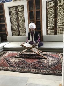 A Muslim Imam reading...